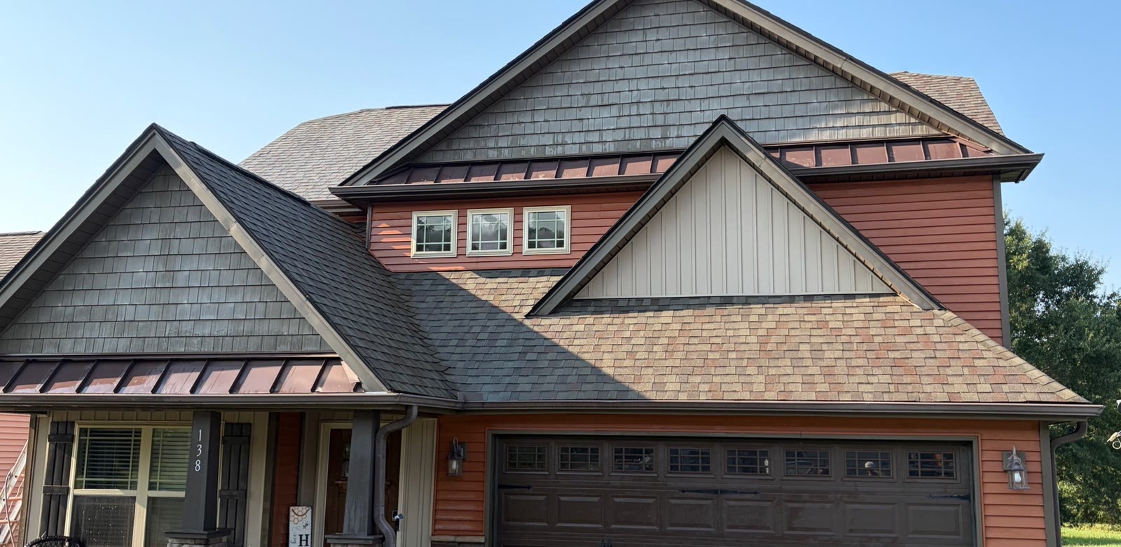 Clean shingle roof after a completed CK Pressure Washing roof wash